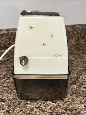 034264424368 OSTER Snowflake Crusher
