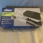 Oster Electric Carving Knife With Case Nib Stainless Steel Blades Fork. Fixed Price $45.00.