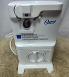 Oster Can Opener And Knife Sharpener Adjustable Height Model # 4032-20 White. Fixed Price $18.77.