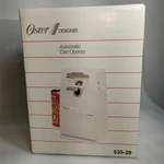 Vintage Oster Designer Automatic Can Opener. Fixed Price $55.00.