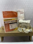 Vtg Nos Presto Above All Automatic Under Cabinet Can Opener. Fixed Price $45.00.