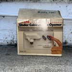 New Rival Under Cabinet Can Opener White Model 7507 In Box Knife Sharpener. Fixed Price $39.99.