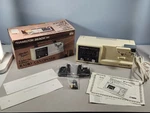 Vintage Hamilton Beach Scovill Model 400 Under Cabinet Radio / Can Opener Nib. Fixed Price $75.00.
