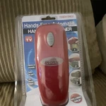 Handy Can-opener Hands-free Automatic Battery Operated Can Opener, Red. Fixed Price $30.00.