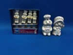 Pillsbury Doughboy Salt & Pepper Shakers Cheese Knives. Fixed Price $15.00.