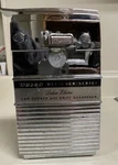 Vintage Udico Designer Deluxe Electric Can Opener Knife Sharpener Chrome. Fixed Price $250.00.