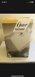 Oster 4736 Ice Crusher White With Dual Settings Course Or Fine. Fixed Price $55.00.