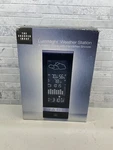 The Sharper Imagine - Luminight Weather Station Hands Free Snooze. Fixed Price $28.00.