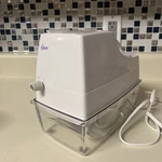 Oster Snowflake Electric Ice Crusher 571-08b - White / Clear Tray Works. Fixed Price $23.75.