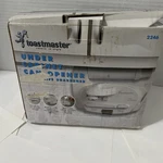 Toastmaster Under The Cabinet Can Opener With Knife Sharpener - Model 2246. Fixed Price $55.99.