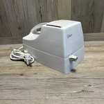 Oster Snowflake Ice Crusher / 571-08b White Tested & Works. Fixed Price $11.95.
