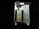 Vintage Iona Automatic Can Opener And Knife Sharpener. Fixed Price $25.00.