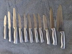10 Pcs Farberware Kitchen Knife Set, Stainless Steel Blades, Silver. Fixed Price $20.00.