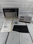General Electric Ge 7-2100 Portable Clock Am Fm Quartz Lcd Pocket Radio W/stand. Fixed Price $46.71.