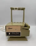 Vtg Oster Cutlery Center Knife & Scissor Sharpener Stand - Avocado Green-works. Fixed Price $18.99.